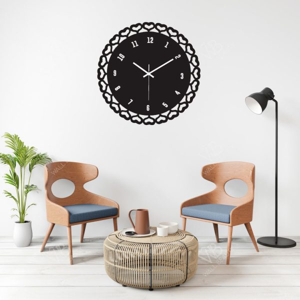 a group of chairs and a clock on a wall